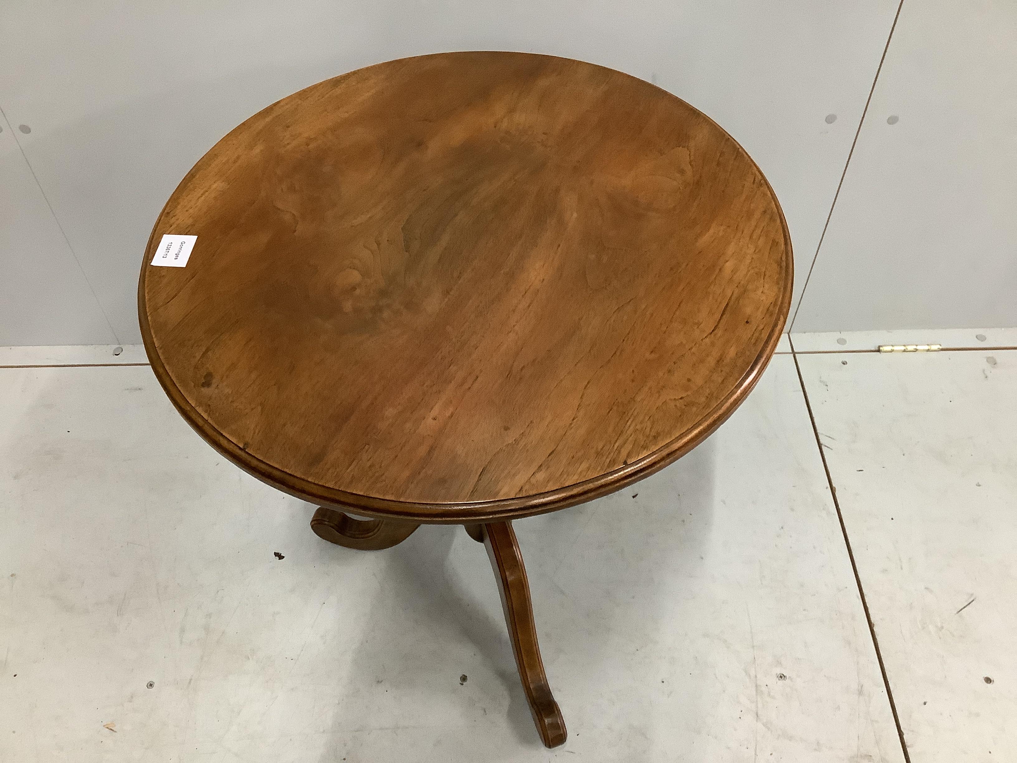 A Victorian style circular walnut tripod wine table, diameter 60cm, height 69cm